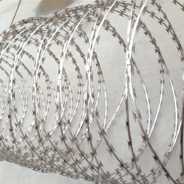 Concertina razor barbed wire for security defence fencing The concertina razor barbed wire is made of the plating steel or stainless steel sheet stamped to be sharp blade shape. High -tension plating steel wire or stainless steel wire in made of defending isolation equipment. As the material of barbed wire and has a unique shape,excellent protection isolation effect can be achieved. Material: Low carbon steel wire ,Galvanized wire ,stainless steel wire Surface treatment: Hot dipped galvanized ,stainless steel, PVC coated, powder coated,paited. Package: With pallet ,raxor barbed wire with waterproof paper or as your request. Application: Mainly used as security barrier around the air port.prison.and other anti-climbing projects. Advantages of Concertina razor barbed wire security fencing Made of high grade galvanized steel of stainless steel Beautiful,economical and practical, good effect,and convenient etc Has an good anti-rest and anti corrosion ability Main material of the product is high grade galvanized and stainless steel sheet A unique shape,excellent protection isolation effect can be achieved. Specification of concertina razor barbed wire BTO-22 razor barbed wire drawingconcertina razor barbed wire interpretation Concertina wire for security defence fencing concertina wire security defence fencingRazor barbed manufacturing shopconcertina razor wire installationconcertina razor barbed wire home securityconcertina wire razor wire community securutyRazor wire school anti climbingconcertina wire factory securityconcertina wire airport isolationRazor barbed wire railway isolationconcertina barbed wire military isolation Packing and delivery of Concertina razor barbed wire security fencing packing and delivery